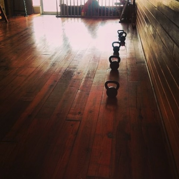 kettlebells on a hard wood floor