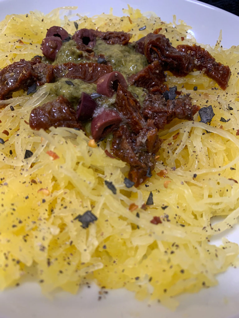 "Confetti" Spaghetti squash with pesto, sundried tomatoes, olive oil, black pepper, black lava salt, olives, red pepper flake