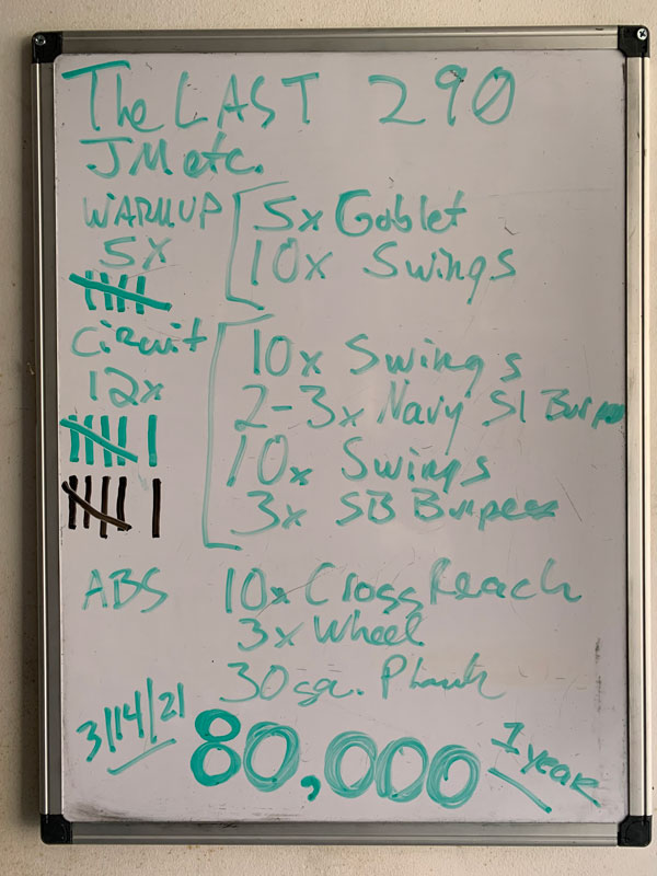 Workout Whiteboard with the last 290 kettlebell swings of 80,000 swings in a year